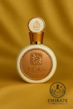 Flacon doré et raffiné du parfum Fakhar Lattafa Women, posé sur fond blanc élégant